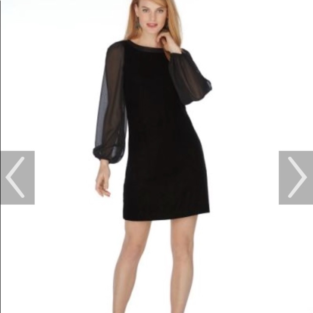 Black dress belle sleeves.